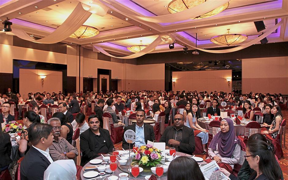 Thirty tables in the Eastin Hotel ballroom in Petaling Jaya were filled with honoured guests enjoying the eight-course lunch with the delicious anniversary cake as the dessert. Photos: AZHAR MAHFOF, AZMAN GHANI and YAP CHEE HONG/The Star