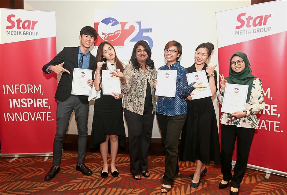 Head of Law Assoc Prof Anne Vergis (third from left) from the University of Reading Malaysia taking a photo with the recipients to mark the occasion.