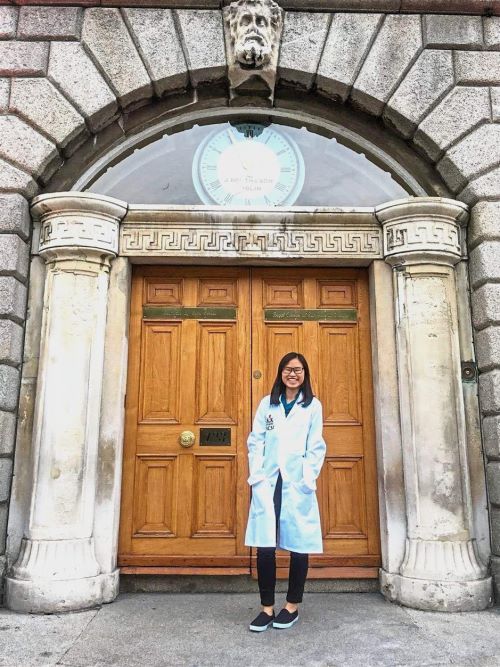 Chan marks the White Coat ceremony with a photo at the main entrance of the old RCSI building.